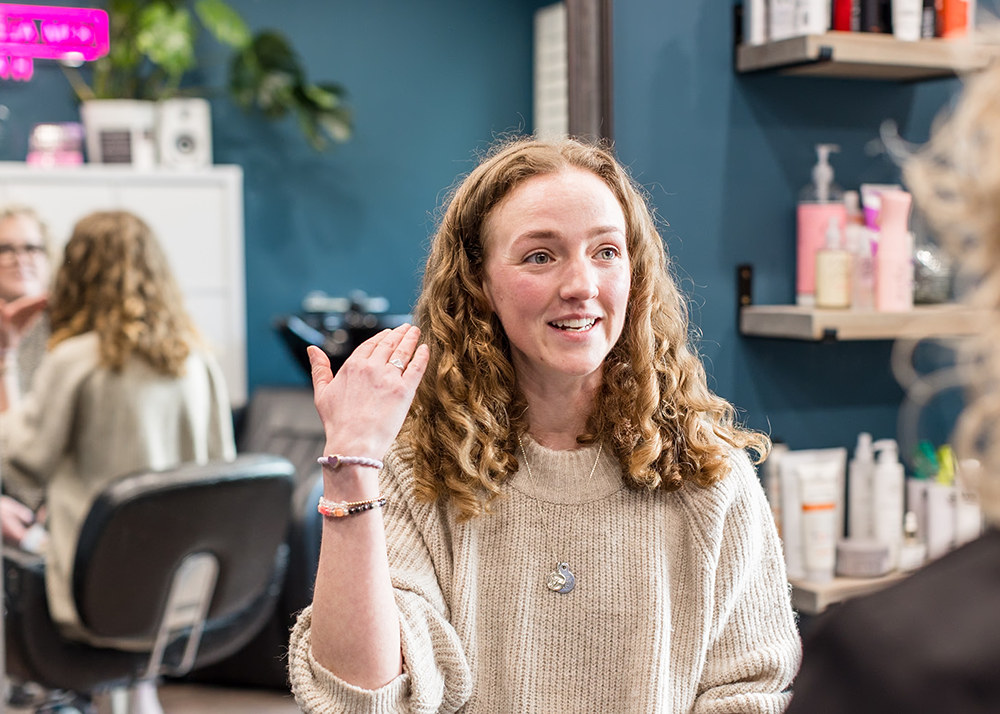 Kim Alexandra styling bridal hair