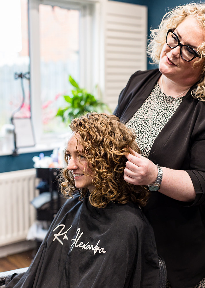 Curl specialist styling hair