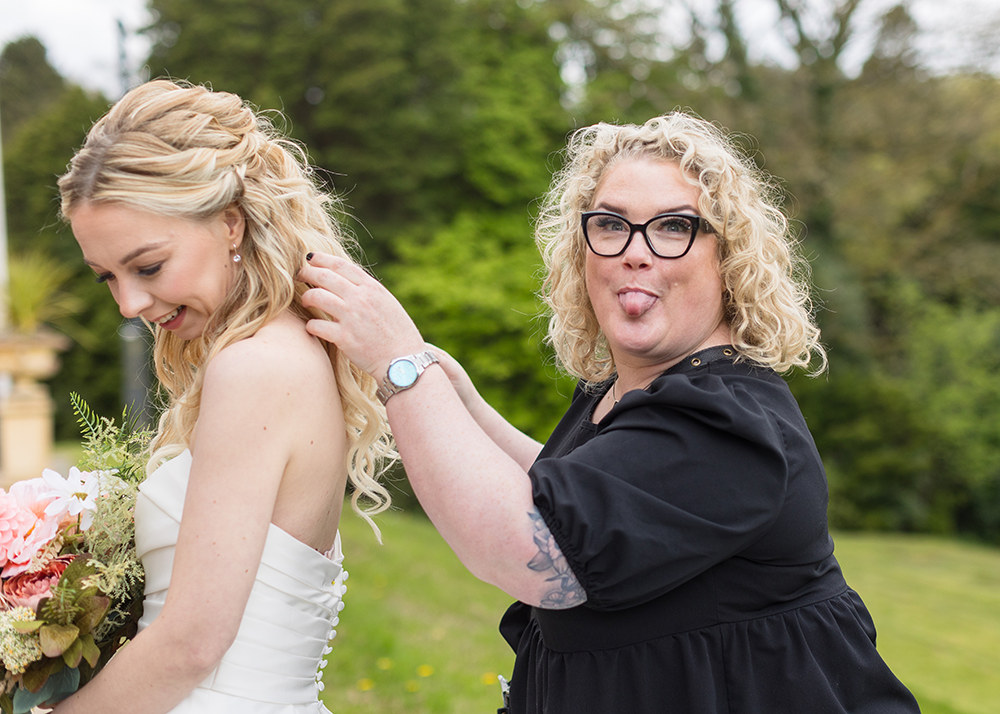 Kim Alexandra styling bride's hair