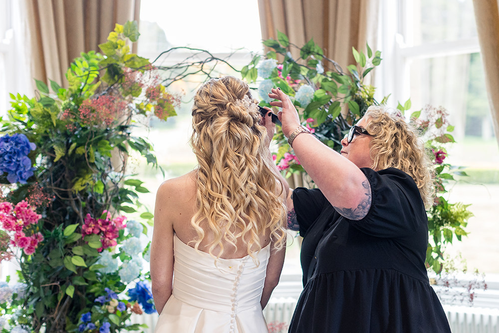 Kim Alexandra styling bridal hair